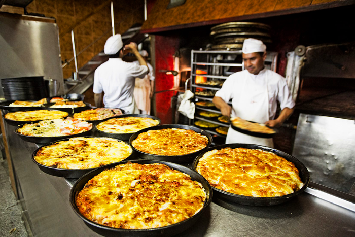 La pizza, como uno de los motivos por los cuales Buenos Aires se posiciona entre las mejores ciudades del mundo para probar comida local. 