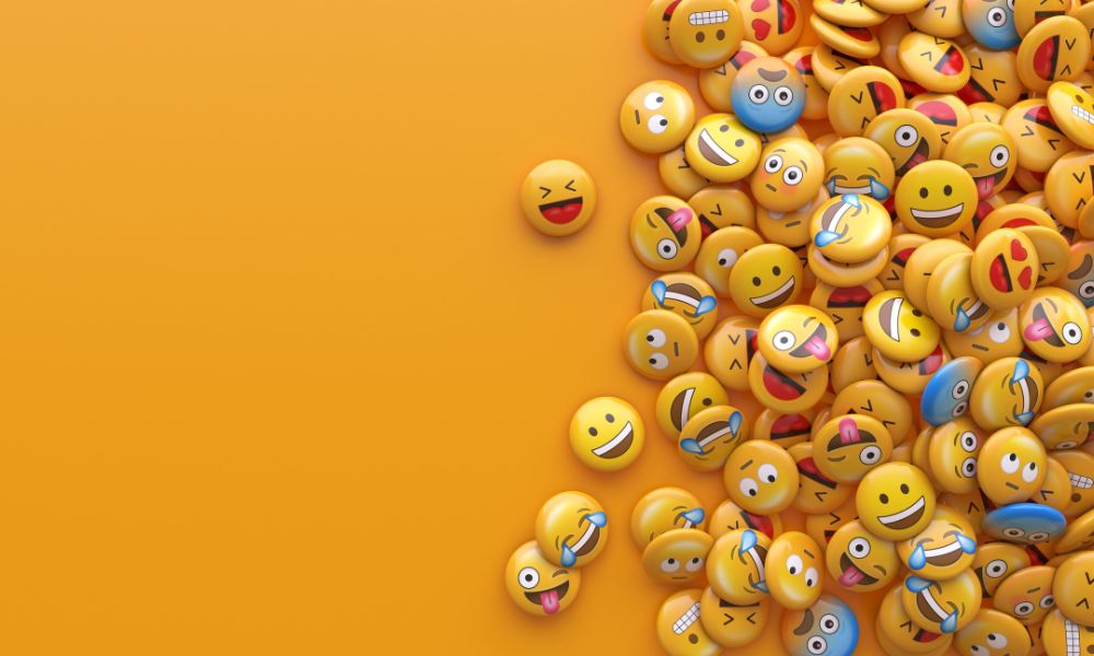 muchos emojis en fondo amarillo