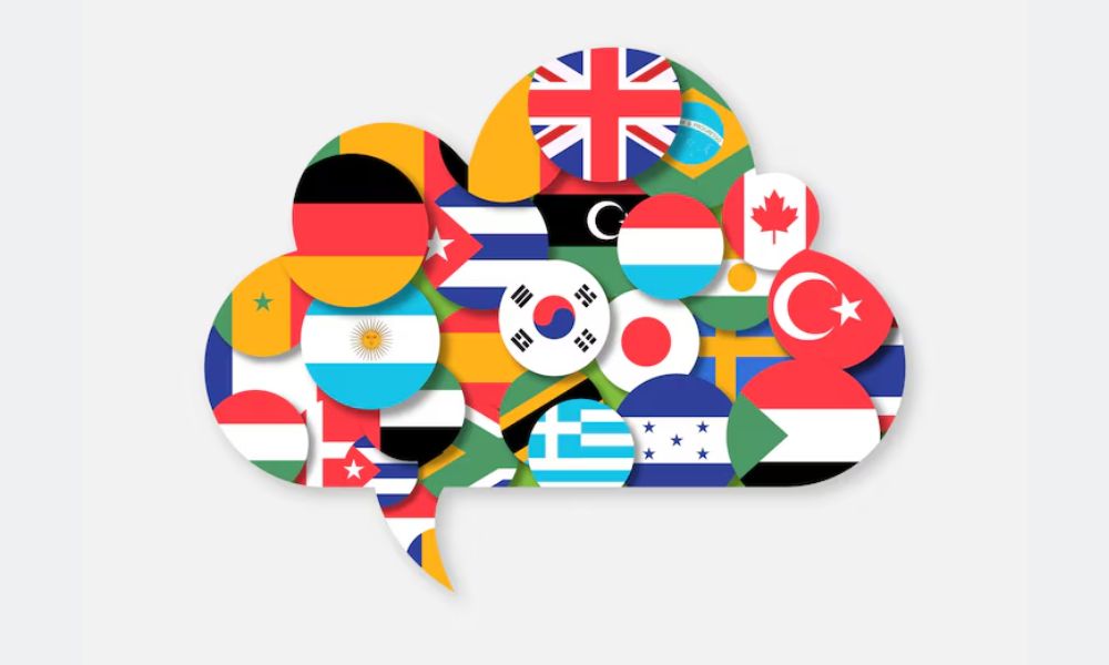 una nube de diálogo rellena de banderas de muchos países para simbolizar idiomas