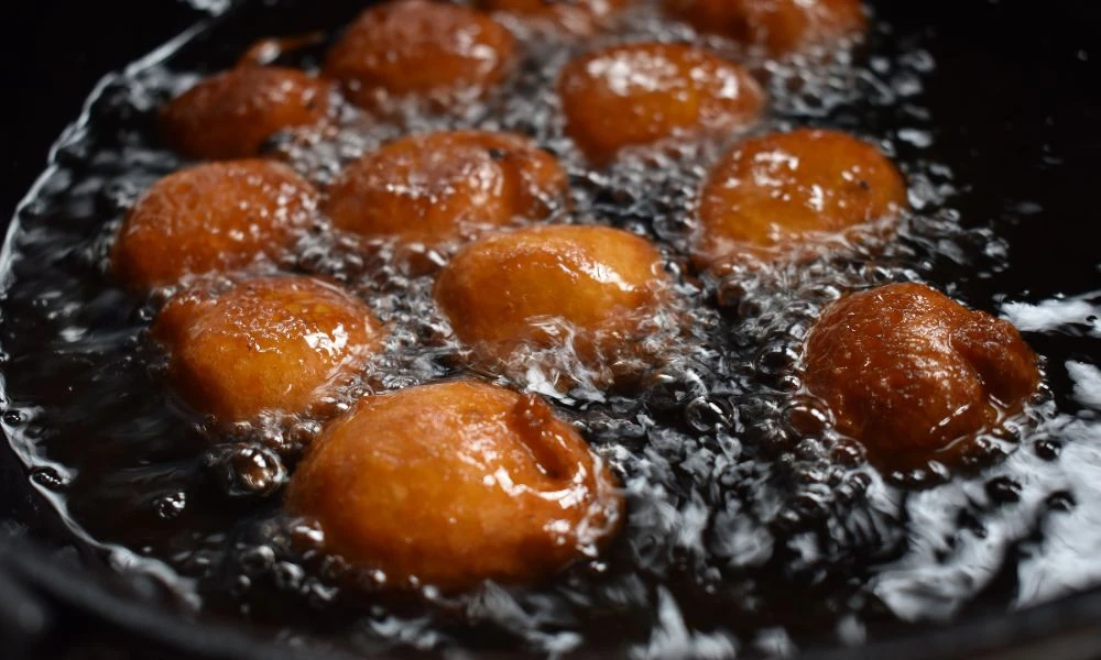Cocinar.